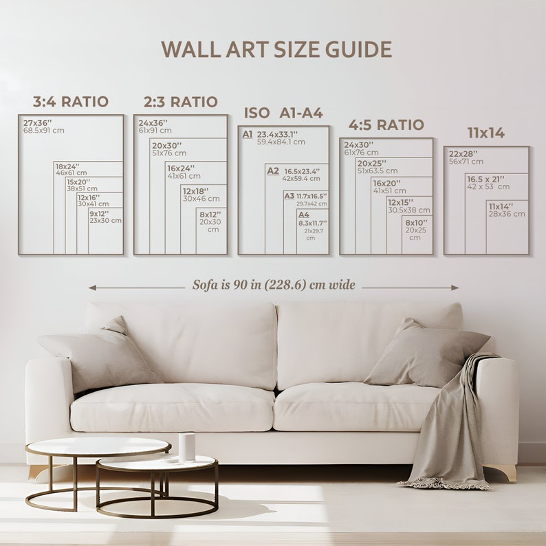 May include: Wall art size guide with dimensions in inches and centimeters. Displays various aspect ratios: 3:4, 2:3, ISO A1-A4, 4:5, and 11x14. A white sofa, 90 inches (228.6 cm) wide, is shown below the guide, with two round coffee tables.