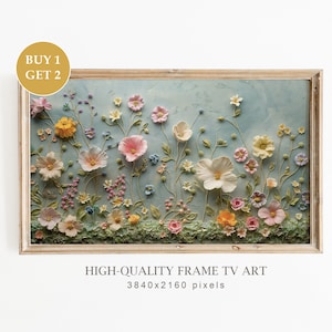 Può includere: Una stampa incorniciata di un arrangiamento floreale 3D con fiori rosa pastello, gialli e bianchi su uno sfondo blu. Il testo "HIGH-QUALITY FRAME TV ART 3840x2160 pixels" è sotto l'immagine.