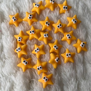 Botones de costura minimalistas de 11 mm con forma de estrella amarilla kawaii con ojos para niños, accesorios de ropa DIY, suministros de costura y manualidades para niños.