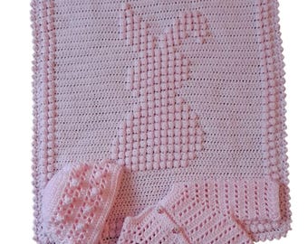 pastel pink baby's basinet/pram blanket with bunny rabbit design
