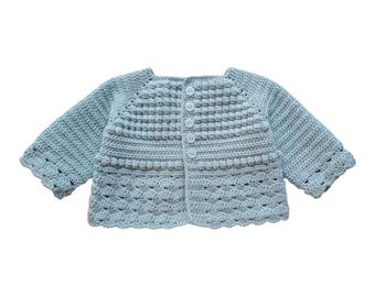 Baby's hand crochet cardigan with bobble and shell design. Duck egg blue, 6 - 12 months.