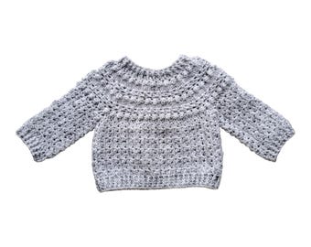 Baby's Handmade Aran Weight Jumper In 'Snow Storm'. 6 - 12 Months.