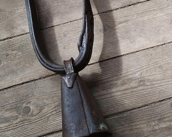Rusty old handforged cow bell on leather collar from Skåne,Sweden. Rustic decor