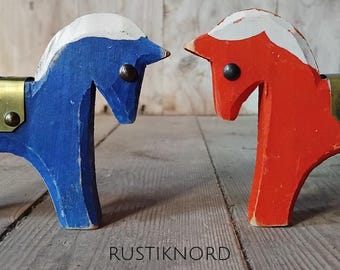 Pair of vintage handmade spotted pony candleholders from Sweden.