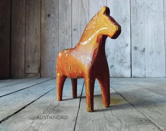 Elderly painted wooden folk horse from Sweden