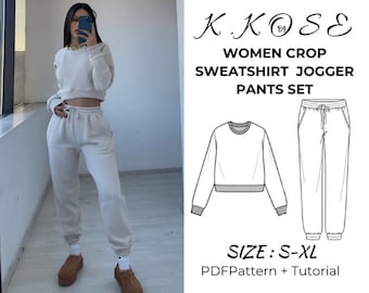 Pode incluir: Um padrão de costura para um conjunto de moletom cropped e calças de moletom para mulher. O padrão inclui um tutorial e está disponível nos tamanhos S-XL. K.KOSE by é o nome da marca.