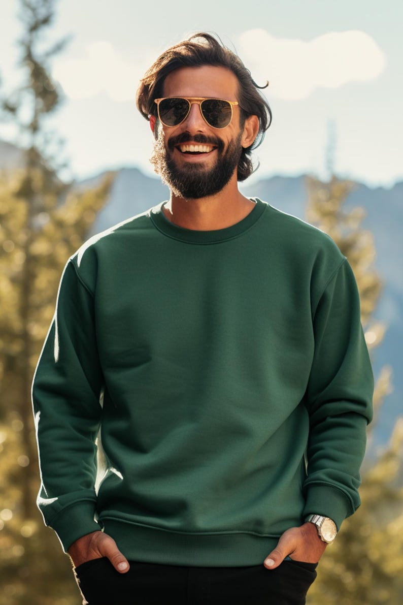 May include: A dark green crew neck sweatshirt with long sleeves. The sweatshirt is made of a soft, comfortable fabric.