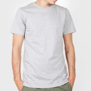 May include: A heather grey short-sleeved t-shirt with a crew neck.