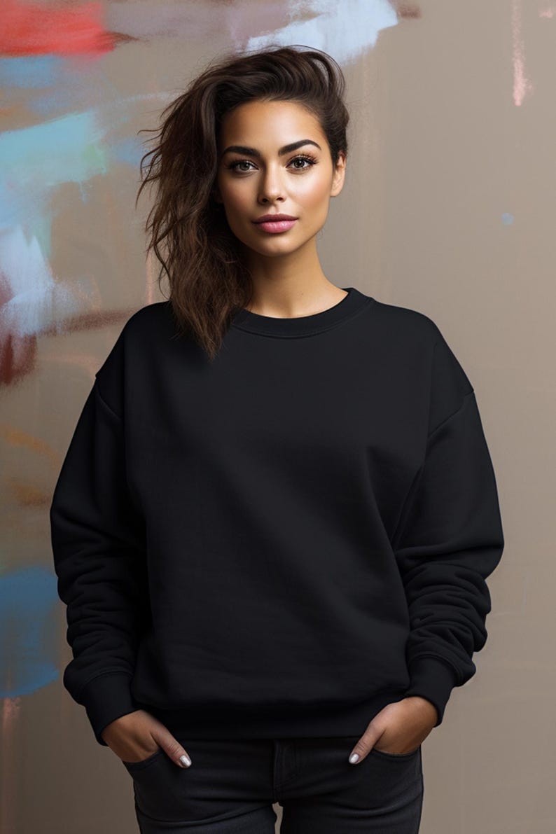 May include: A black sweatshirt with long sleeves and a crew neck.