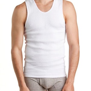 May include: A white sleeveless undershirt with a ribbed texture. The undershirt is made of a soft, comfortable material.