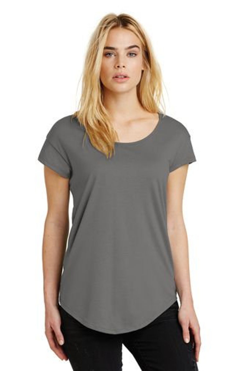 May include: A gray, short-sleeved, scoop neck t-shirt with a relaxed fit.