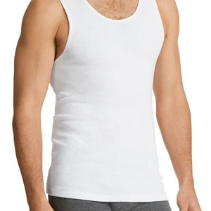 May include: A white sleeveless undershirt with a scoop neck.