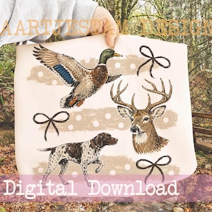 May include: A light-coloured fabric sheet featuring a printed design of a flying mallard duck, a deer head, a spotted hunting dog, and three black line-drawn bows. The background includes horizontal beige brush strokes with white polka dots.