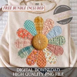 Könnte beinhalten: Ein cremefarbenes Sweatshirt mit einem großen, farbenfrohen Blumen-Applikation. Die Blütenblätter bestehen aus verschiedenen gemusterten Stoffen in Orange-, Blau-, Rosa- und Gelbtönen. Die Mitte der Blume ist ein strukturiertes, beiges Kreismit Stickdetails. Der Text "DIGITALER DOWNLOAD HOCHWERTIGE PNG-DATEI" steht unten.