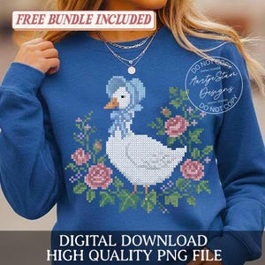 May include: A blue sweatshirt featuring a cross-stitch design of a goose wearing a bonnet and surrounded by flowers. The text "FREE BUNDLE INCLUDED" is at the top. The bottom of the sweatshirt reads "DIGITAL DOWNLOAD HIGH QUALITY PNG FILE".