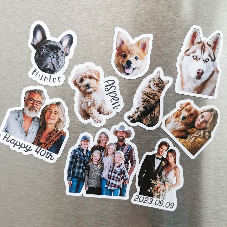 May include: A set of nine personalized magnets featuring photos of people and pets. The magnets include a couple, a family, a dog, a cat, and a group of children. The magnets are decorated with text, including "Happy 40th", "Hunter", "Aspen", and "2023.09.09".