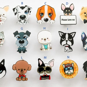 May include: A set of 15 colourful dog-themed buttons featuring various breeds and expressions. The buttons depict a range of dog breeds, including a pug, a chihuahua, a bulldog, a husky, and a poodle. The buttons are all different colours and have different expressions on their faces. Some of the buttons have text on them, such as "Please Love me" and "Super French Bulldogs".