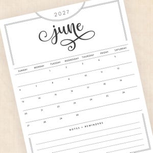May include: A black and white printable calendar page for June 2027. The design features a large cursive header for the month, the year 2027, a grid with days of the week from Sunday to Saturday, numbered dates, and a section for notes and reminders.