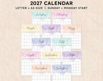 May include: A printable 2027 calendar featuring twelve monthly pages with pastel watercolor backgrounds and heart motifs. The text reads PRINTABLE 2027 CALENDAR, LETTER + A4 SIZE | SUNDAY + MONDAY START, with each month labeled in cursive script.