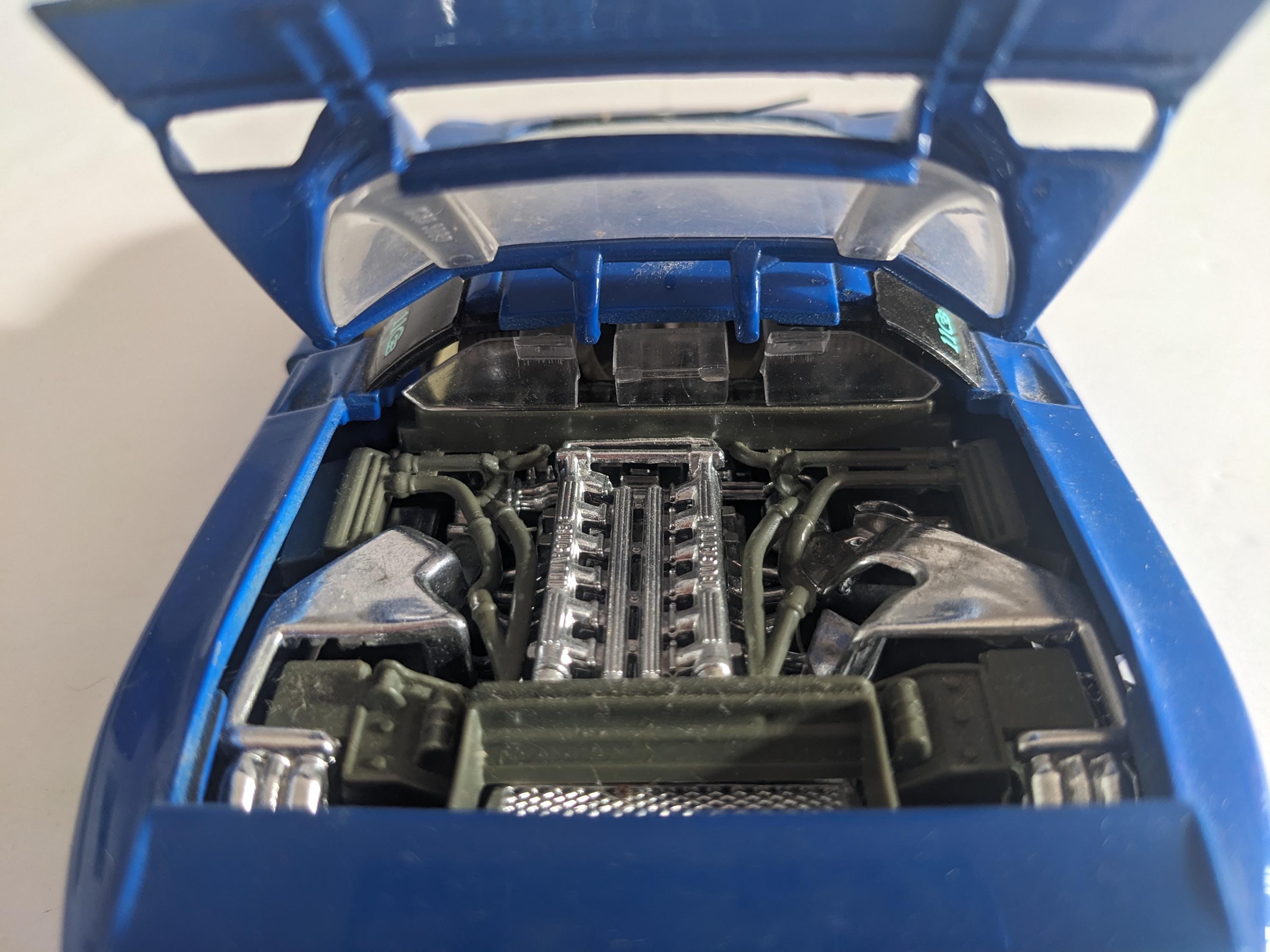 Miniature BUGATTI EB110 #34 24H du MANS 1990 Bleue BURAGO BUR28010BL | Collect World