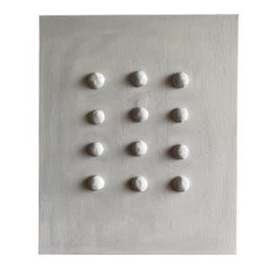 May include: A white canvas painting with a grid of 12 raised circles.