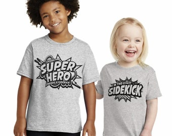 Every superhero needs a sidekick sibling shirts.