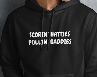 Scorin’ Hatties Pullin’ Baddies Hockey Hoodie – Funny Hockey Gift