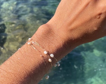 Delicate water-resistant bracelet with pearl beads