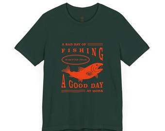 May include: Dark green t-shirt with the text "A BAD DAY OF FISHING IS BETTER THAN A GOOD DAY AT WORK" in orange. The shirt features an orange illustration of a fish.