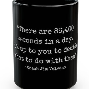 May include: Black coffee mug with a white inspirational quote by Coach Jim Valvano: "There are 86,400 seconds in a day. It's up to you to decide what to do with them."