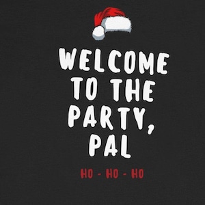 May include: Black t-shirt with the text "WELCOME TO THE PARTY, PAL" in white, along with a small Santa hat graphic. The phrase "HO - HO - HO" is printed in red below the main text.