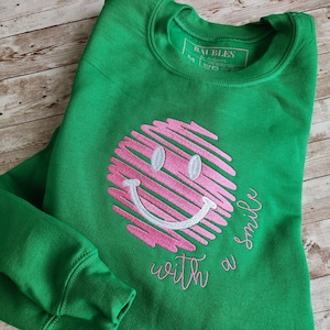 Camiseta de manga corta - Sudadera con cara sonriente colores personalizables Con una sonrisa
