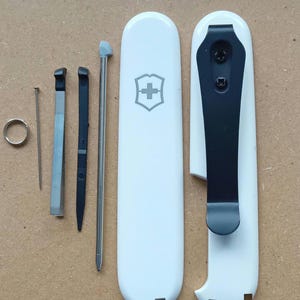 Custom modified Victorinox(genuine)91mm + clip..various colours &  finish +Tool set + releflctive dangler/lanyard