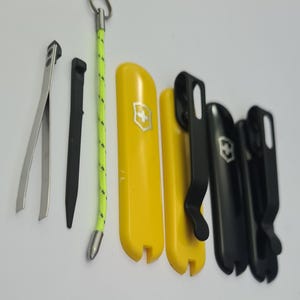 Custom modified  sak 58mm scales with clip + Black Toothpick.tweezers.split ring...various  colours.