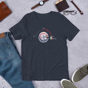 May include: Dark gray t-shirt featuring a graphic of a gauge with the text "Italian" and the Italian flag. The gauge has markings from "low" to "max". The shirt is made of a soft material.