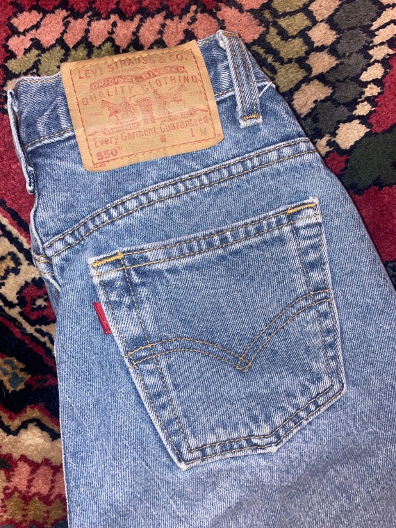 Levi’s 550 Light/Medium Wash Denim Jeans - image 1