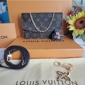 70's Louis Vuitton Clutch with Eclair Zipper Pull 1 - Shop Quirk