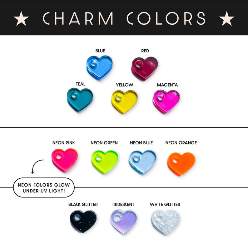 May include: A variety of heart-shaped charms in multiple colors, including blue, red, teal, yellow, and magenta. Neon pink, green, blue, and orange charms are also shown. The text "CHARM COLORS" is at the top.