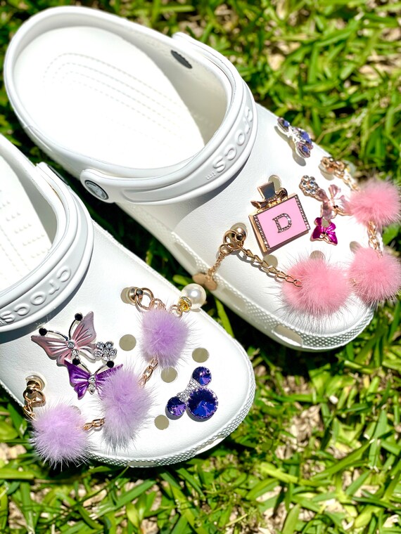 Pom Pom Crocs Chain Set . Pink Croc Chain Set. Purple Croc Chain Set . Sold  as a 4 Piece Set . Croc Chains . Butterfly Croc Charm . 