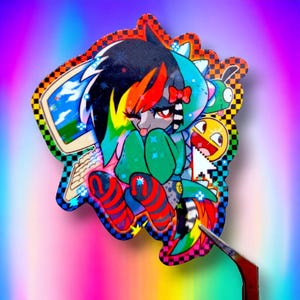 May include: A colorful sticker featuring a cartoon character with rainbow hair and a green shirt. The character is holding a computer mouse and is surrounded by other colorful graphics, including a computer screen, a smiley face, and a checkered pattern.