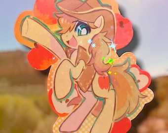 May include: A cartoon sticker of a pony with a pink and yellow body, brown hair, and a brown hat. The pony is wearing a brown vest and has an apple on its side. The sticker is surrounded by red hearts and a yellow background.