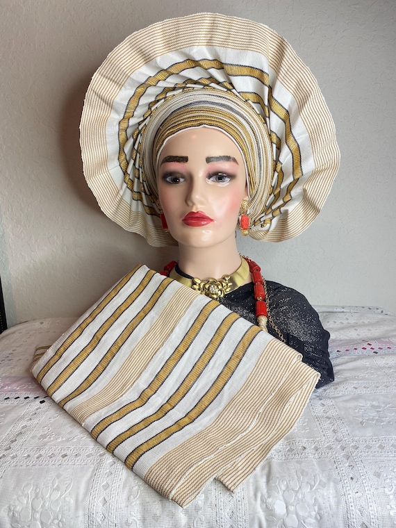 autogele headtie for wedding and special events. White and gold color aso oke