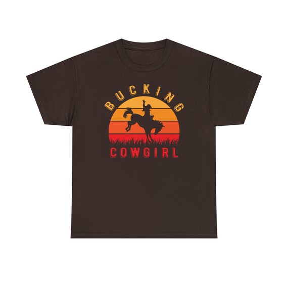 Bucking Cowgirl Shirt - Saddle up and embrace your wild side with our "Bucking Cowgirl Tee"!