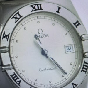 Authentic vintage, omega, constellation, silver, and white 32 MMM watch