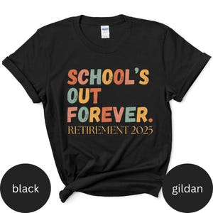 May include: Black t-shirt with the text "SCHOOL'S OUT FOREVER. RETIREMENT 2025" in orange, teal, and pink lettering. The shirt is a Gildan brand.