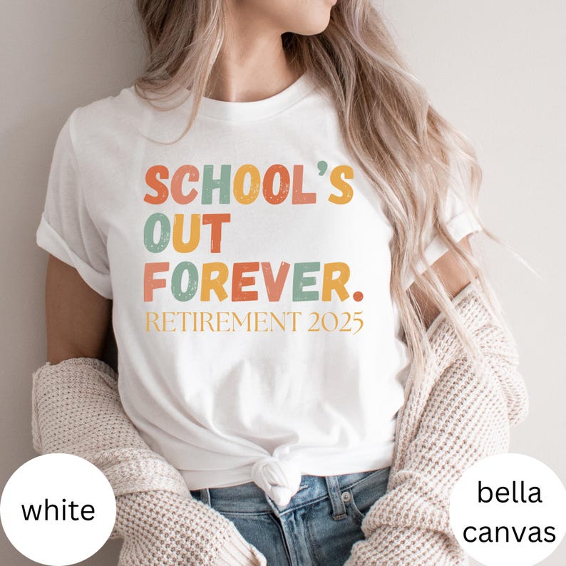 May include: White t-shirt with the text "SCHOOL'S OUT FOREVER. RETIREMENT 2025" in orange, green, and yellow. The shirt is made of a soft material and is a Bella + Canvas brand.