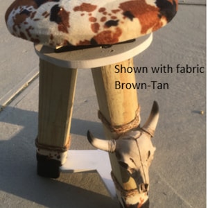 Cowhide bar stool with western ranch theme