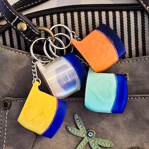 Mini Vaseline Lip Therapy Keychain; Works with keys, purse, backpack and more!