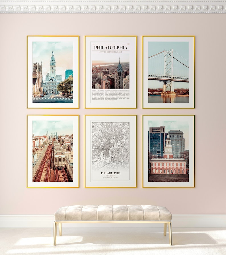 May include: A set of six framed prints depicting various images of Philadelphia, Pennsylvania. The prints include a cityscape, a bridge, a train, a map, and two different views of the city's historic buildings.