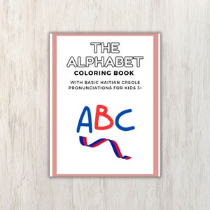 May include: A pink and white book cover with the title "The Alphabet Coloring Book" and the text "With Basic Haitian Creole Pronunciations for Kids 3+". The cover also features the letters "ABC" in blue, red, and blue, with a red and blue ribbon underneath.